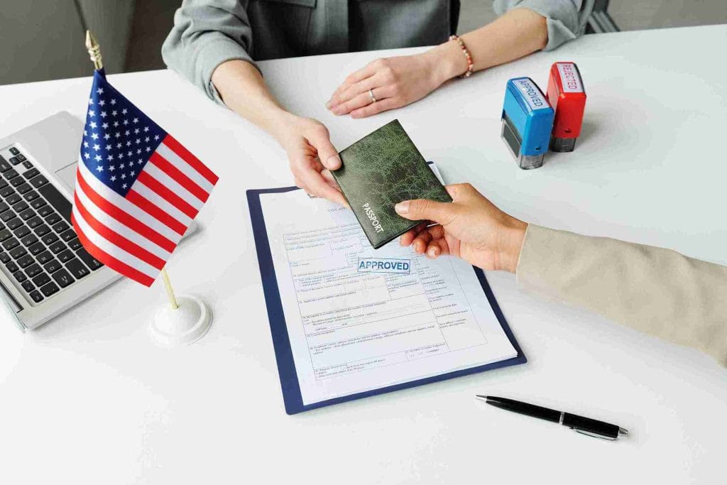 A Consultant handover the passport.