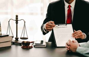 professional-lawyer-pointing-at-contract-document