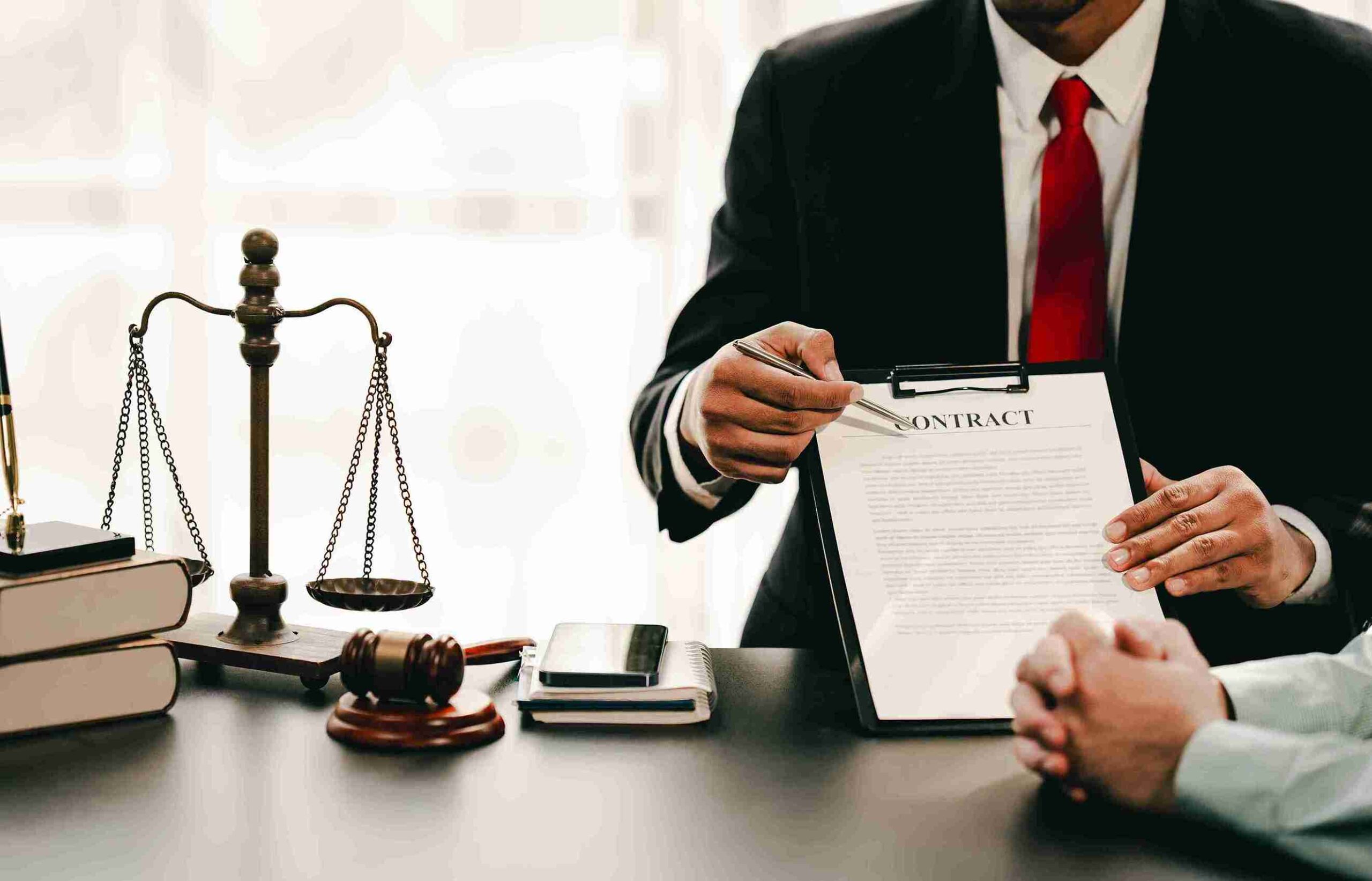professional-lawyer-pointing-at-contract-document