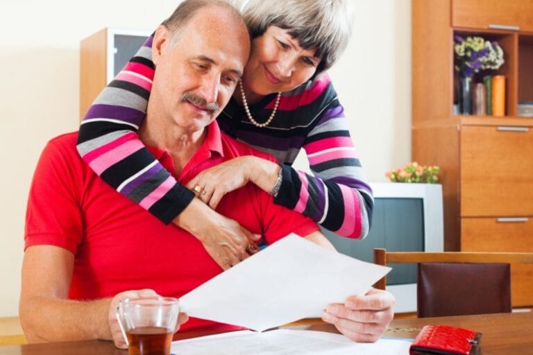 How Much to Make a Will in 2025 (We can see an old Couple and an old man that is looking at his will while estimating the will fee)