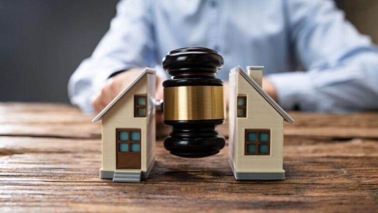 (An image can be seen showcasing a solicitor discussing boundary dispute)