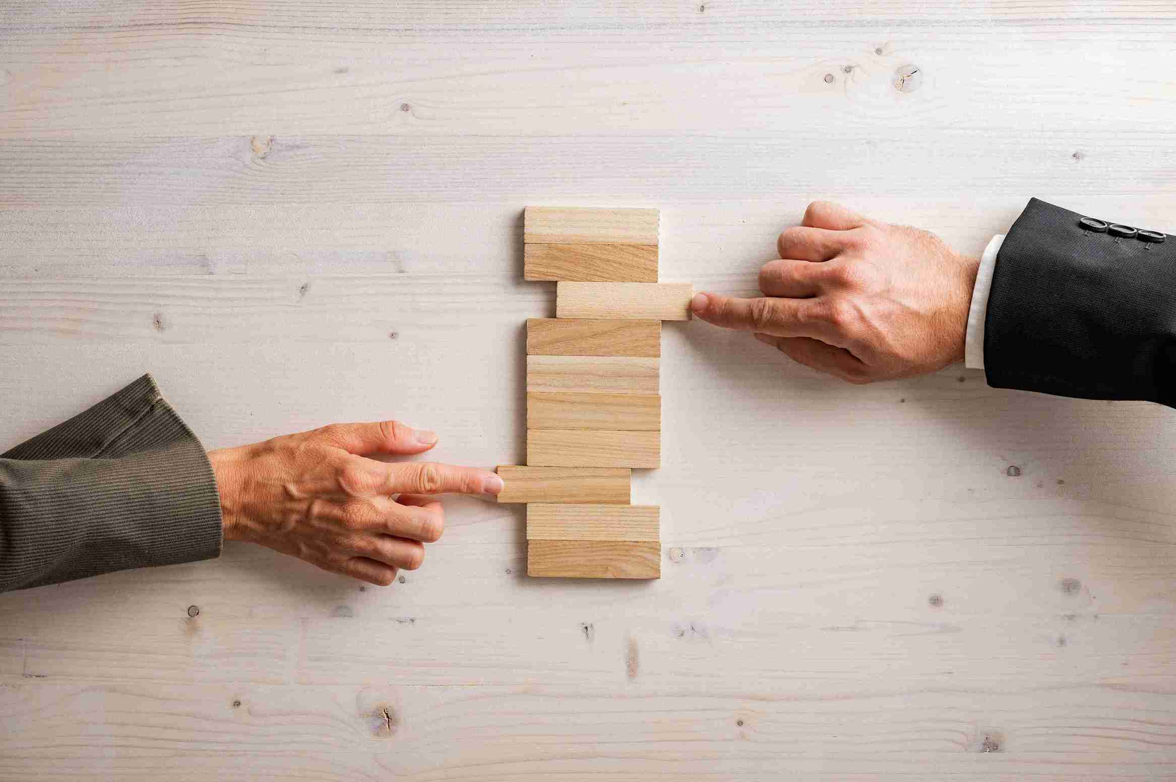 business-risk-strategy-with-blocks-on-table