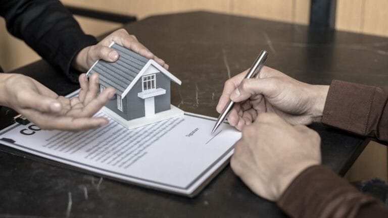 (In the image it can be seen that a property settlement agreement is being signed) How to Finalise a Property Settlement Agreement in the UK