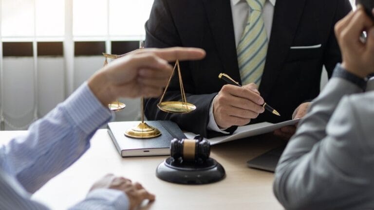 (In the image it can be seen that a land registry dispute is being discussed in official settings) Land Registry Disputes How to Protect Your Property Rights and Resolve Title Issues