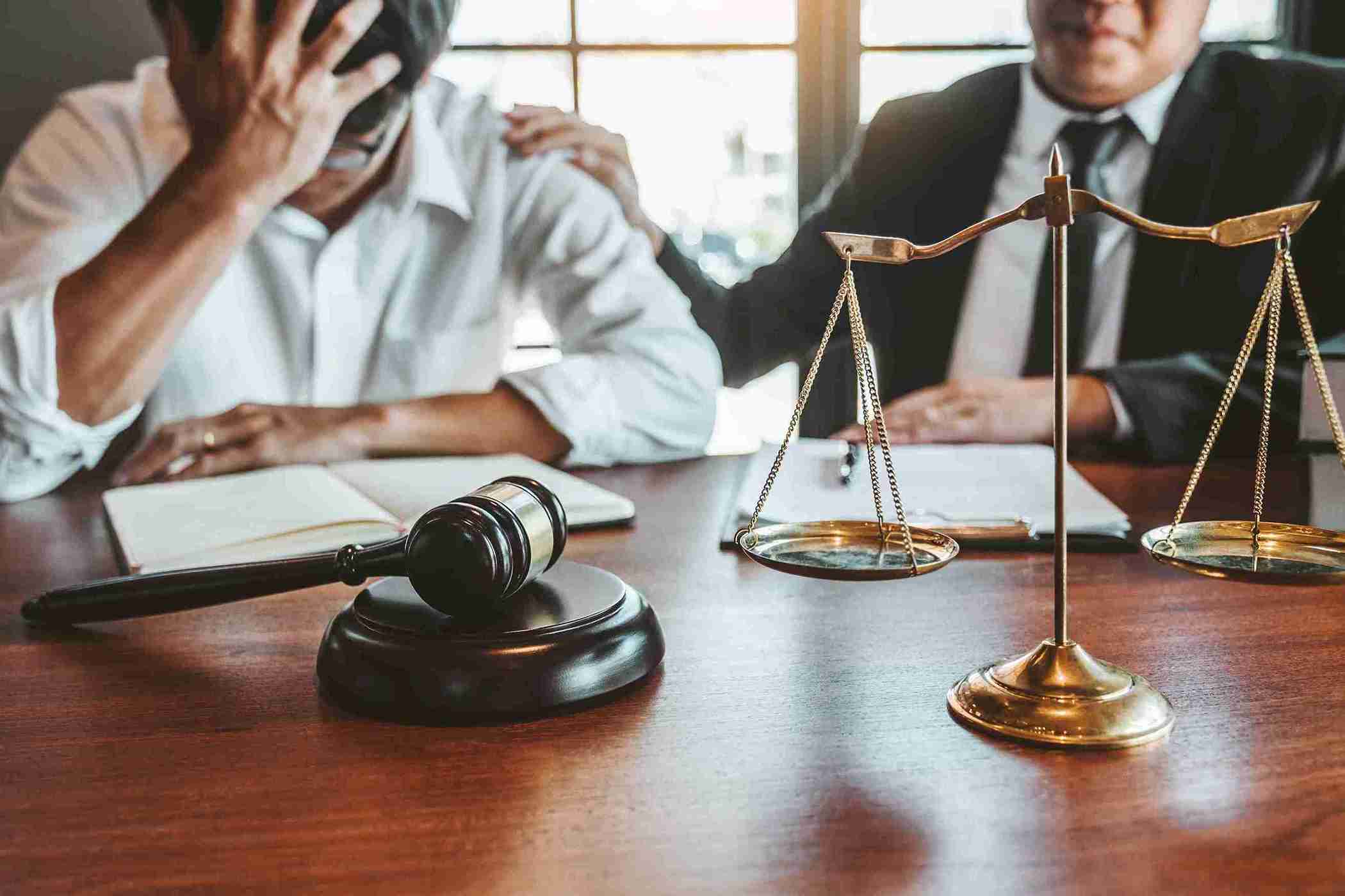 legal-grief-man-receives-counsel-at-law-office