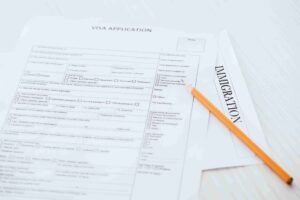 A person can be seen in the image applying for an asylum application