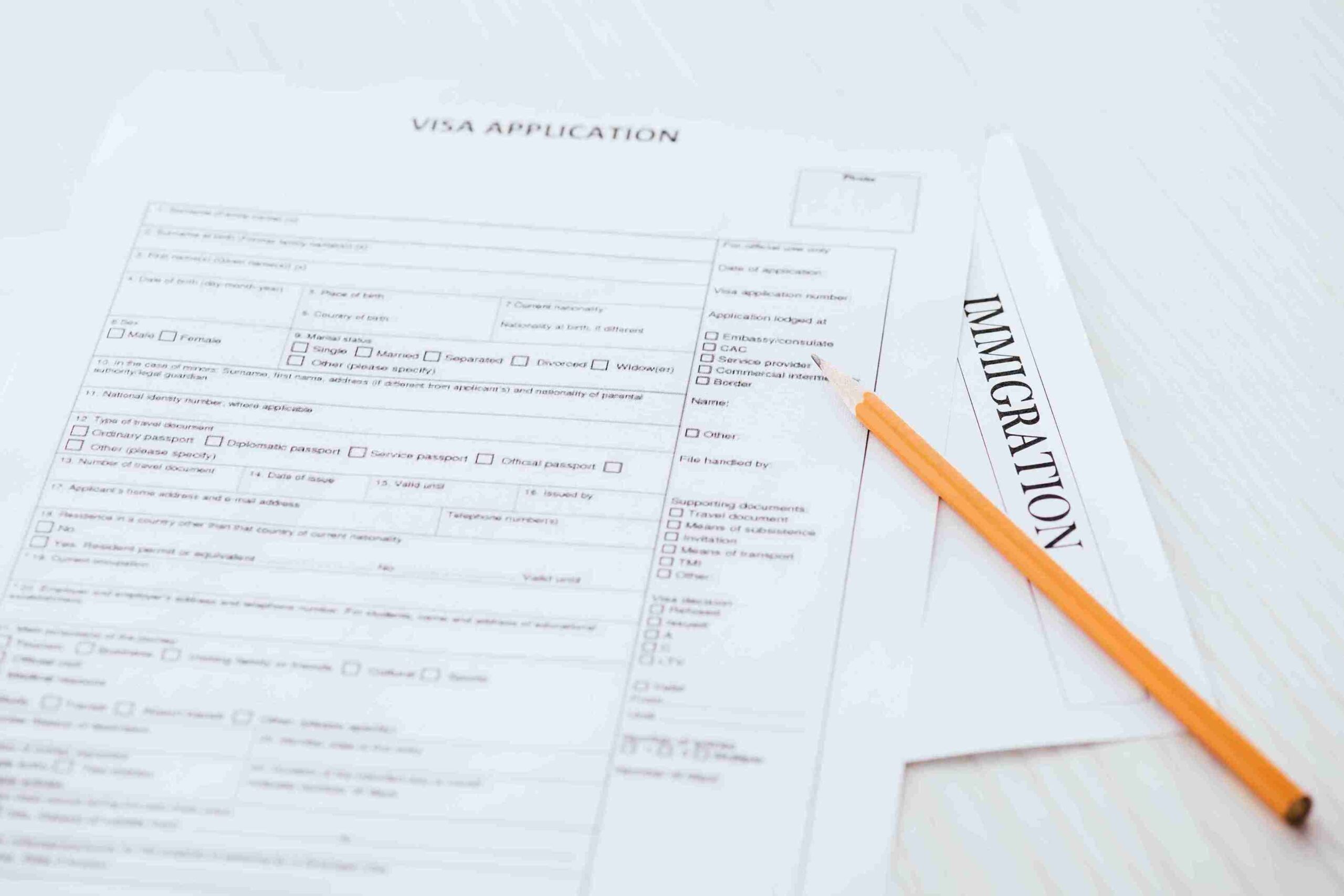 A person can be seen in the image applying for an asylum application