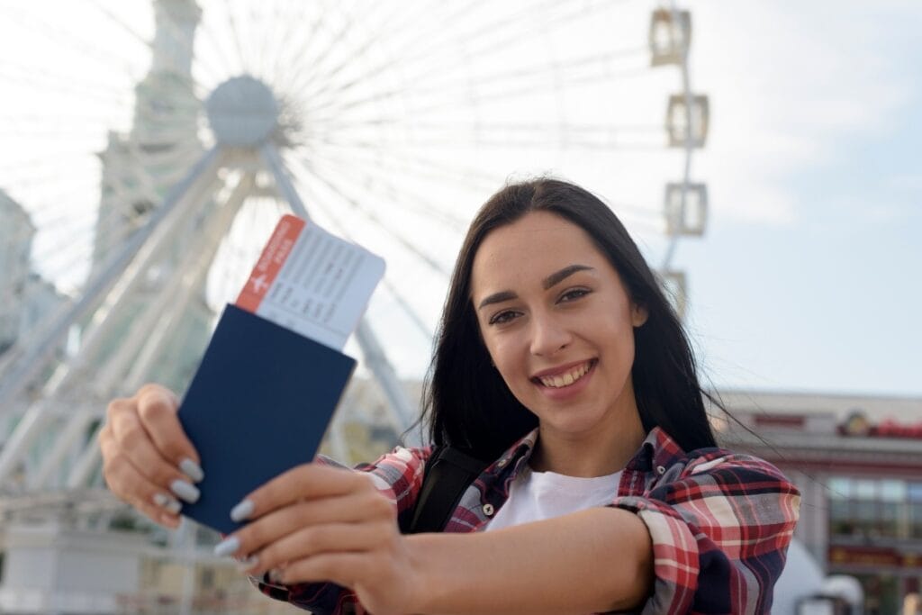 (the image show a women carrying her Family visa UK)