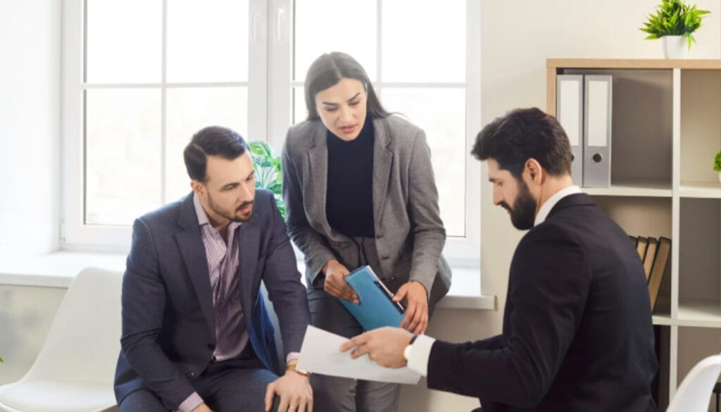 A diverse group of people discussing health and care visa UK to discover care workers eligibility for the visa