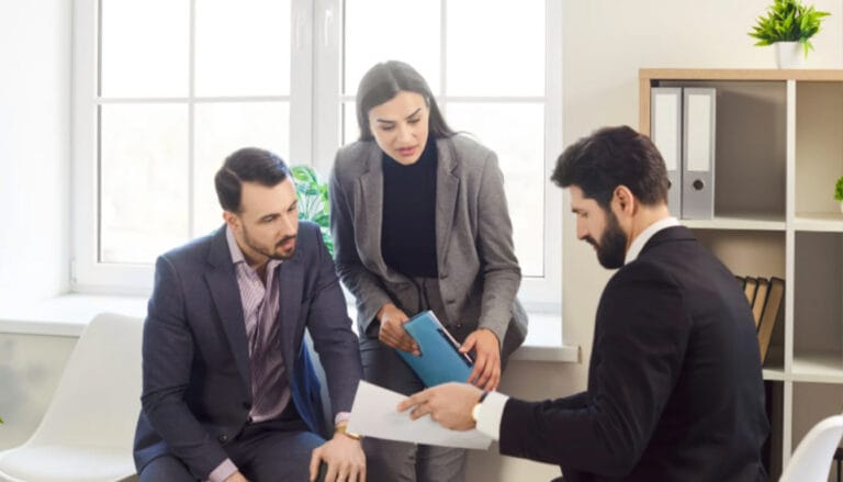 A diverse group of people discussing health and care visa UK to discover care workers eligibility for the visa