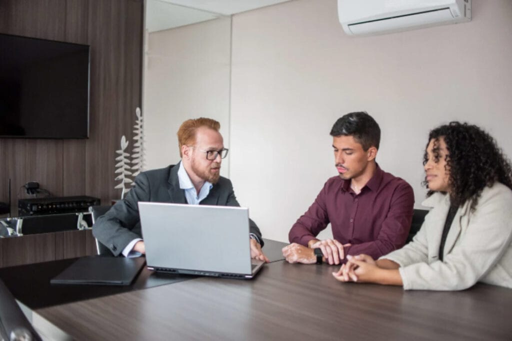 Immigration lawyer advising clients on UK visa fees and application costs.