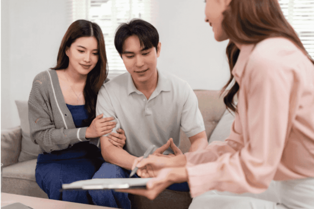 Couple consulting an immigration specialist about 10 year route requirements
