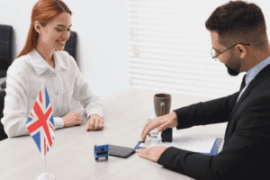 UK Skilled Worker visa interview and eligibility check with an official.