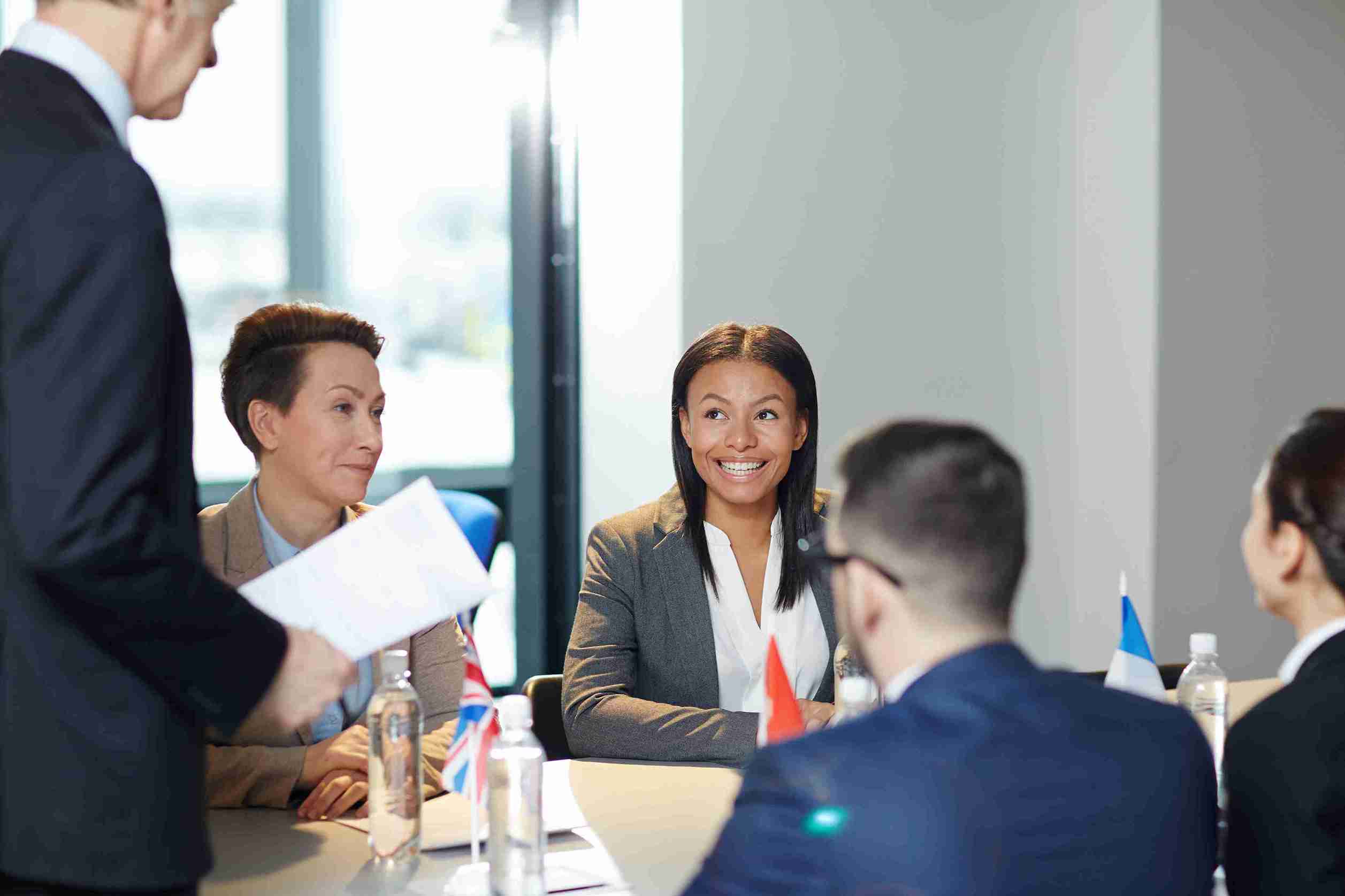 Corporate meeting with colleagues in an office.