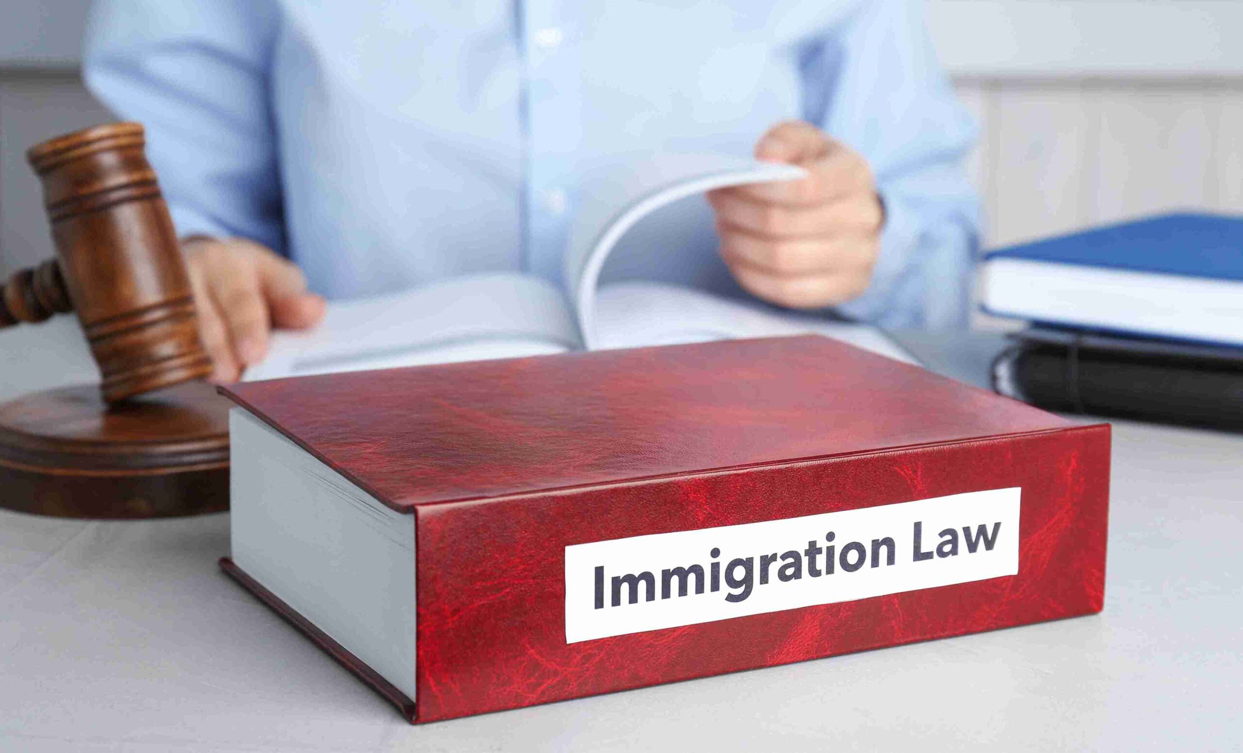 A gavel and legal documents representing immigration law in India, symbolizing justice and legal processes.